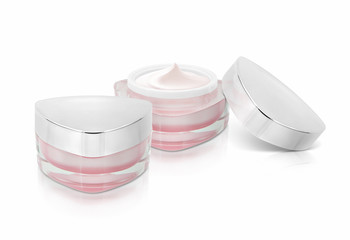 Two pink triangle cosmetic jar on white background