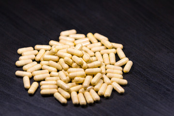 pills/drug isolated on black background