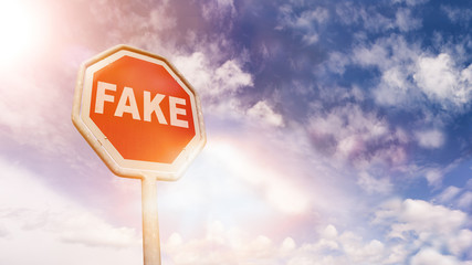 Fake on red traffic road stop sign