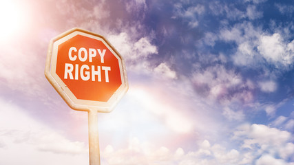 Copyright on red traffic road stop sign