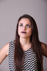 Obraz premium Young woman thinking