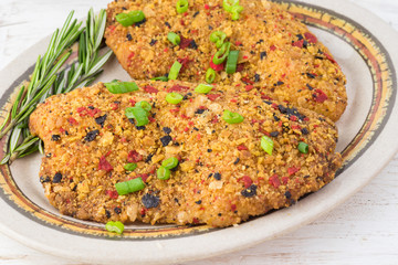 Baked fillets of tilapia coated with tortilla, chipotle and lime crust.