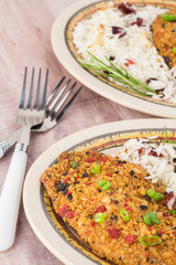 Baked tortilla crusted tilapia with cranberry rice.