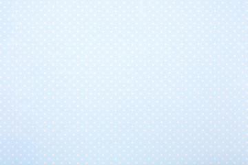 Pastel blue polka dot fabric background for baby