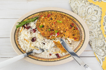 Baked tortilla crusted tilapia with cranberry rice.