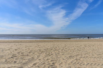 Seascape horizon line Sandy Beach Netherlands. Heavenly expanse
