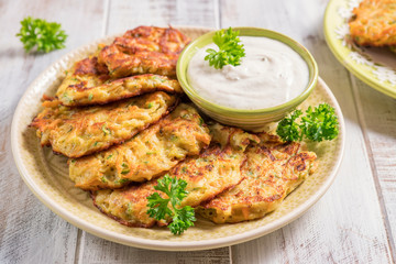 Vegetable fritters with potato, carrot, zucchini served with Ranch sauce.