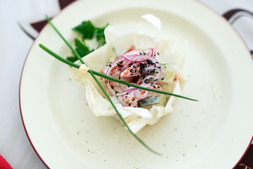 salad on a white plate
