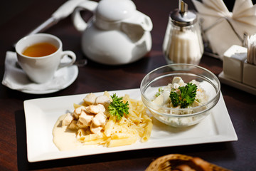 Closeup of pasta with chicken on plate