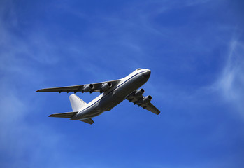 Large jet if flight in cloudy sky