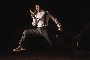 Singer with microphone and black background