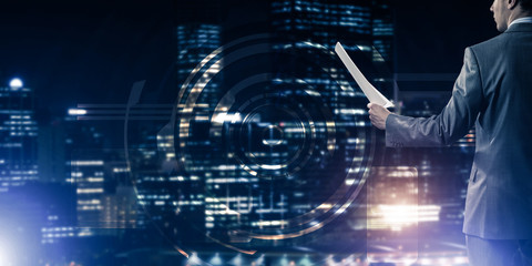 Digital background with infographs and man extending papers or c