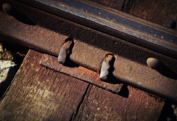 Detail of an old rusty rail joint