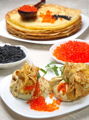 Pancake pouches with red and black caviar.