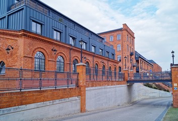 Loft Aparts.  Ancient textile factory - details of architecture of the city of Lodz, Poland -...
