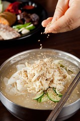 Chogye guksu. cold chicken noodles. It's a asia style cuisine.