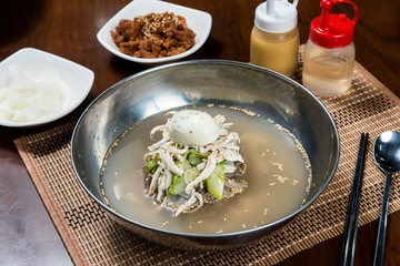 Chogye guksu. cold chicken noodles. It's a asia style cuisine.
