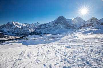 Jungfrau ski resort in Swiss Alps with famous Eiger, Monch and Jungfrau mountains in the background