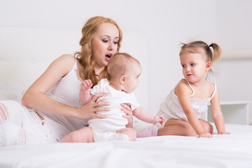 Mother playing with children