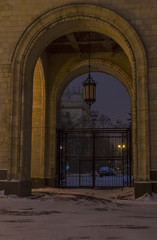 Arch with lantern hanging in it. Main Building of Moscow State University.