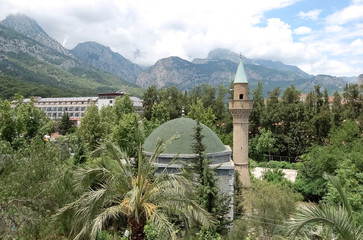 View of the mosque in a green garden on the Antalya coast.
