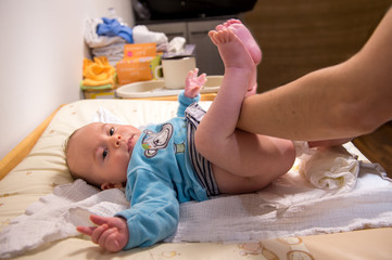 changing newborn's diaper