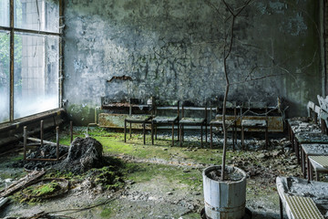 Spooky waiting room in the hospital in the ghost town of Pripyat, Ukraine