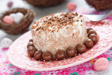 Chocolate curd paskha with chocolate candy on Easter