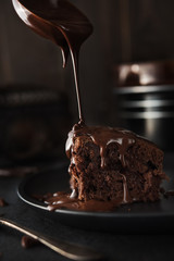 Chocolate cake on dark background - 137849909