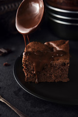 Chocolate cake on dark background