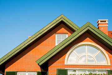 modern chalet with attic windows