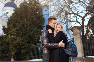 Fototapeta premium Love hipster couple man and woman with black clothes walking in the city