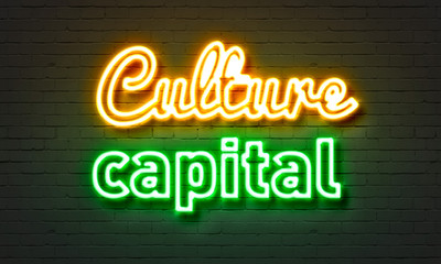 Fototapeta na wymiar Culture capital neon sign on brick wall background.