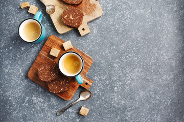 Cup of espresso and chocolate salami.