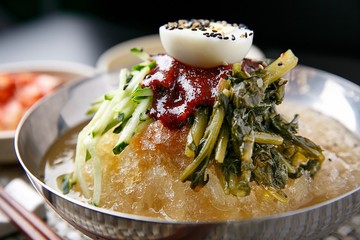 Noodles in Young Summer Radish Kimchi Broth. yeolmu kimchi guksu