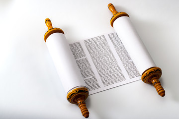 Judaism and religious text concept with a Torah on white background - obrazy, fototapety, plakaty