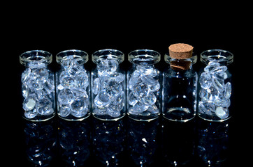 Diamonds in glass.