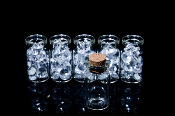 Diamonds in glass.