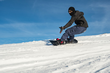 Fototapeta na wymiar Snowboard freerider in the mountains