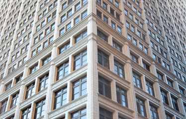 Tall building with lot of windows symmetric view