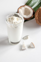 cocktail with coconut on white background