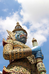 giant guard statue at thai temple 