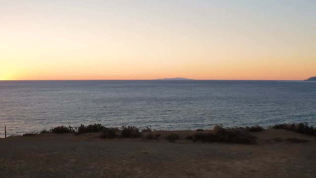 Malibu Aerial Point Dume Sunset v25 Flying low over Point Dume panning at sunset.