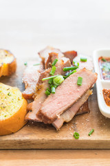 charcoal-boiled pork neck with garlic bread