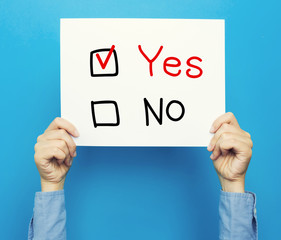 Yes No text on a white poster