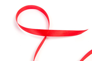silk red ribbon on white background