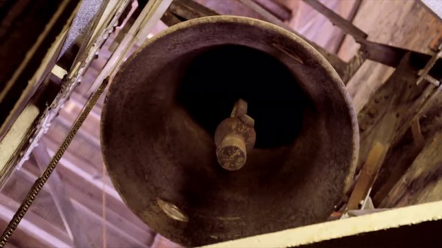 In an Old Church at the Belfry a Bell stops ringing and make the last sound