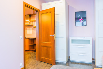 Interior bedrooms with wardrobes and a chest of drawers