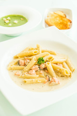 Penne carbonara pasta with salmon