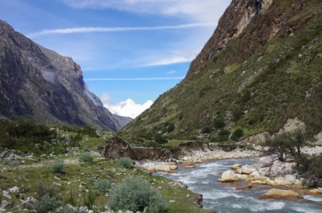 Fototapeta na wymiar Mountain valley and river. Huascaran National Park, Cordillera Blanca - Santa Cruz Circuit Trekking. Peru